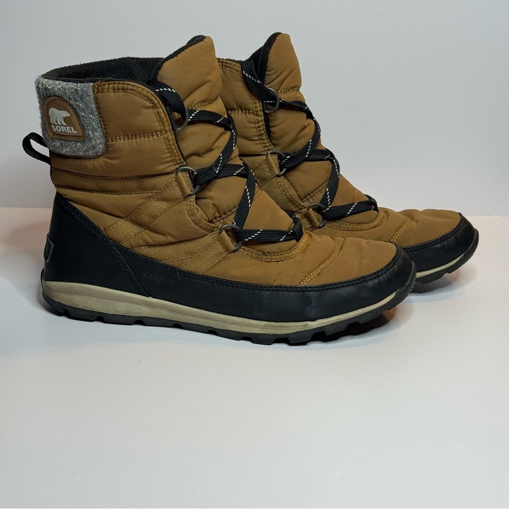 Sorel Tan and Black Winter Boots